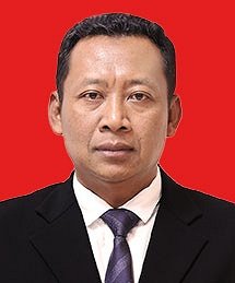 Potret Dr. Fitroh Rohcahyanto saat mengenakan seragam kebesaran Korps Adhyaksa, memancarkan wibawa seorang jaksa senior.