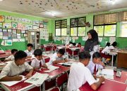 Grafik alur pendaftaran Pra SPMB SMP Kota Tangerang 2026 pada layar perangkat digital.