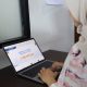 Tampilan antarmuka (interface) portal Sobat Dukcapil Kota Tangerang pada layar smartphone.