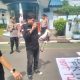 Aksi demonstrasi massa di depan kantor PDAM Kabupaten Tangerang terkait dugaan korupsi proyek air.