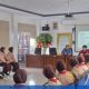 Anggota Saka Bhakti Husada menyimak pemaparan materi penyakit menular dari dokter coas di Aula Puskesmas Mauk yang didampingi dr. Allan Sartana.